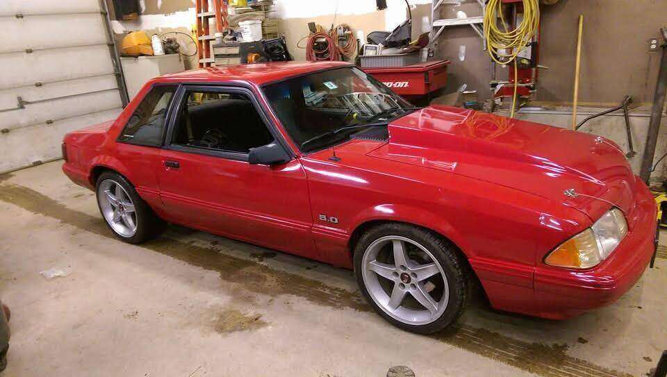 Red Fox-body Mustang 5.0 in the shop