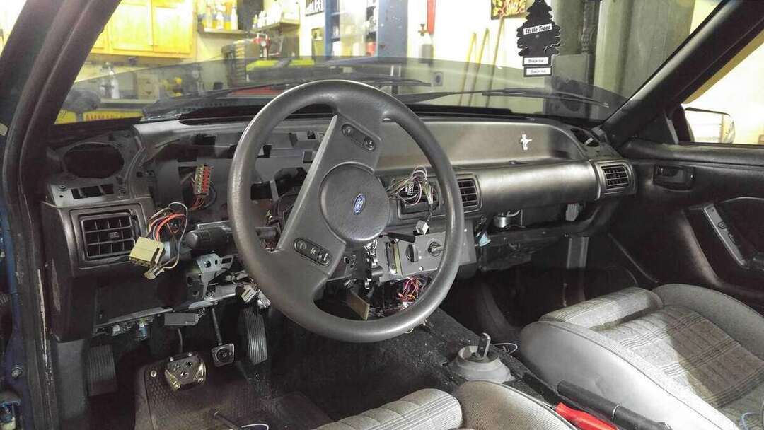 Mustang instrument trim and steering column partly removed