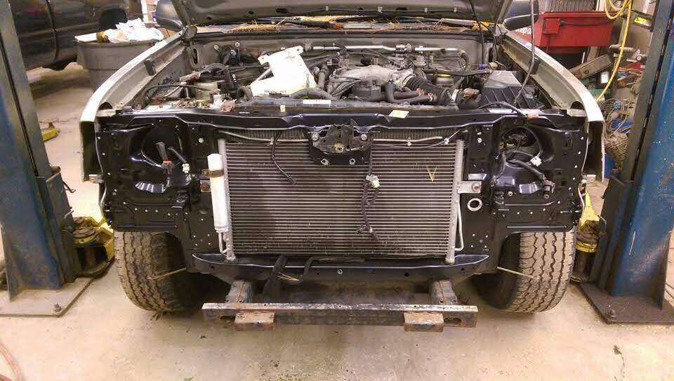 Repaired Nissan front support refinished in black
