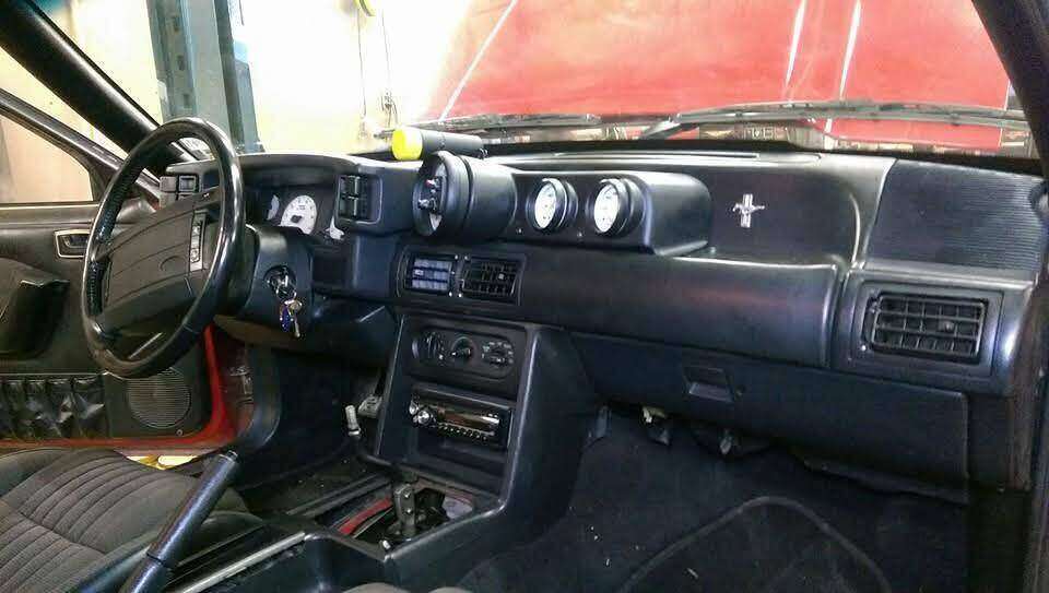 Finished Fox-body Mustang dashboard with auxiliary gauges