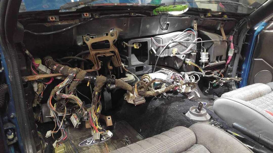 Mustang HVAC and wiring area exposed behind the dashboard