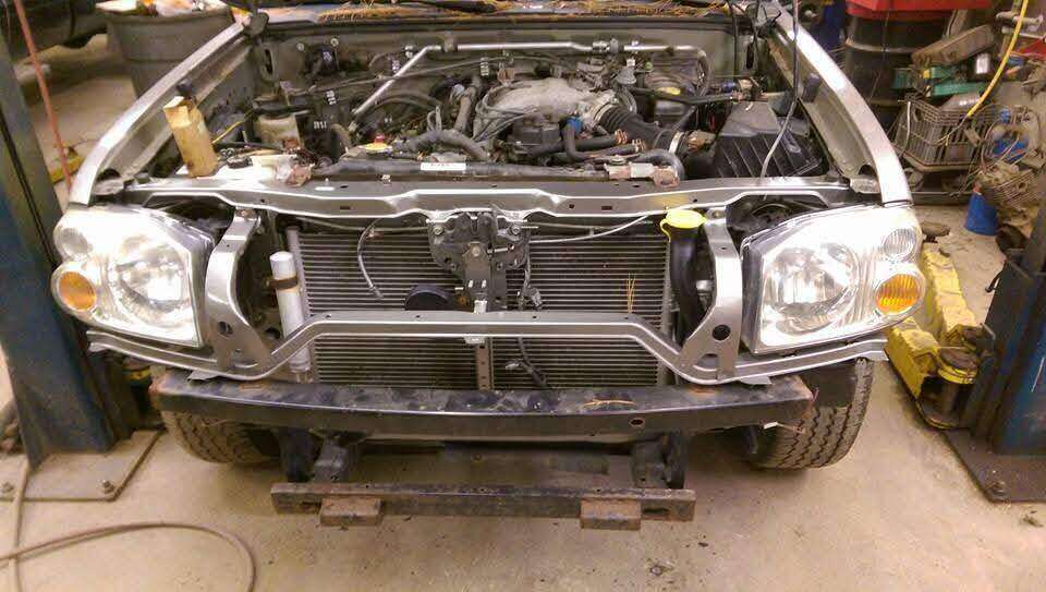 Nissan truck with headlamps and cooling components refitted