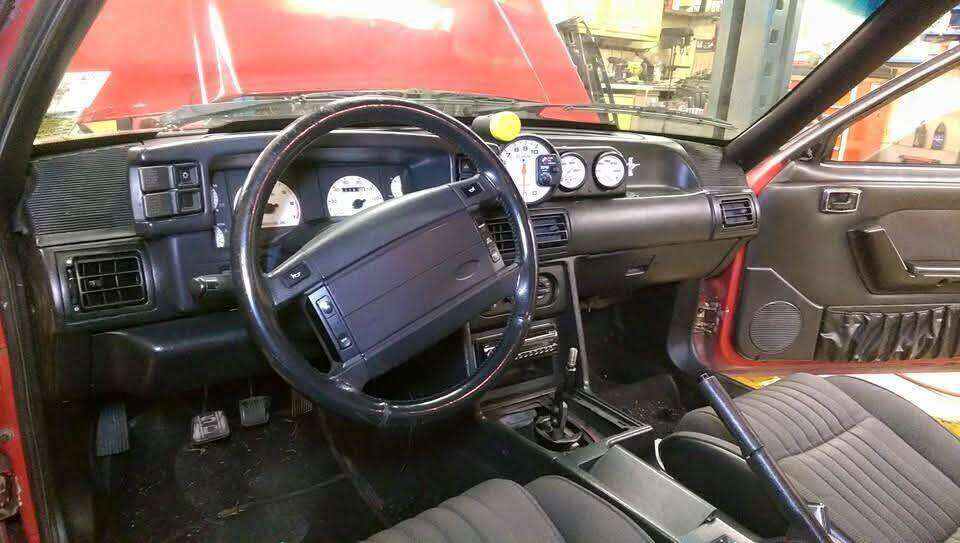 Driver view of Mustang controls and installed gauges