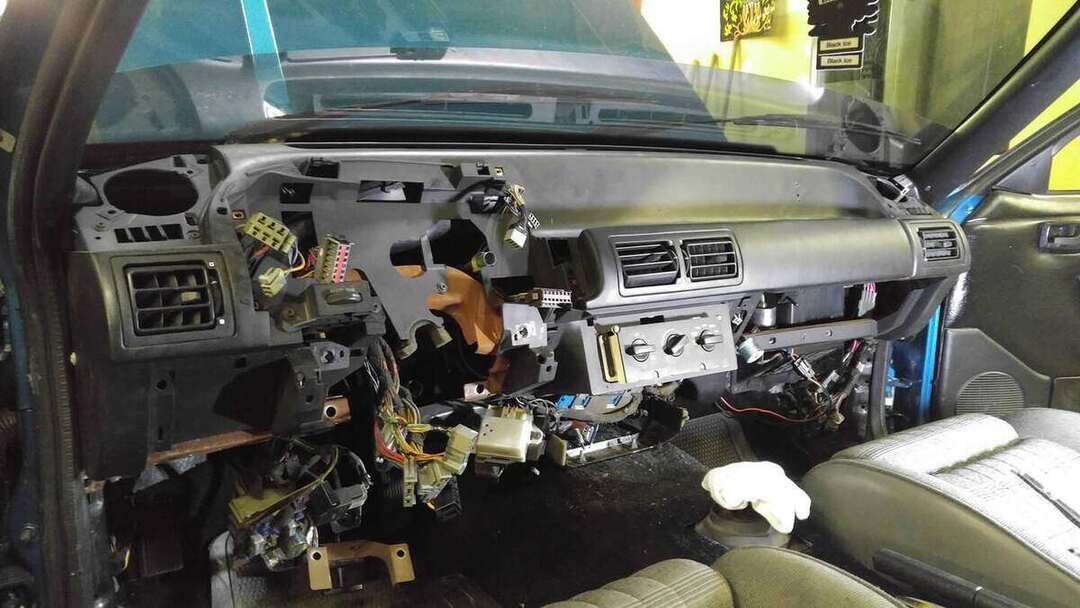 Mustang dashboard harness routing checked before assembly