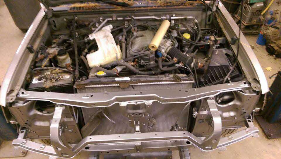 Upper support and cooling components installed on a Nissan truck
