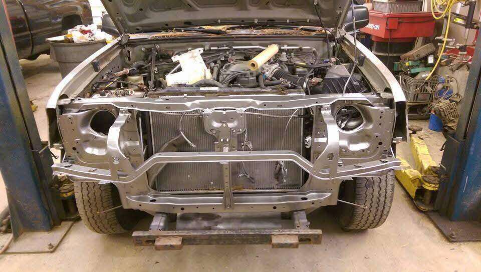 Repaired silver Nissan front structure ready for assembly