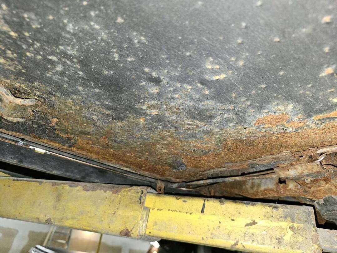 Original brake line and underbody condition on a 1992 Ford Mustang GT
