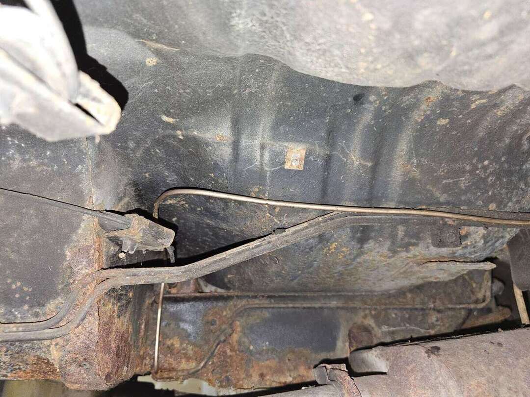 New brake line routed along the underbody of a 1992 Ford Mustang GT