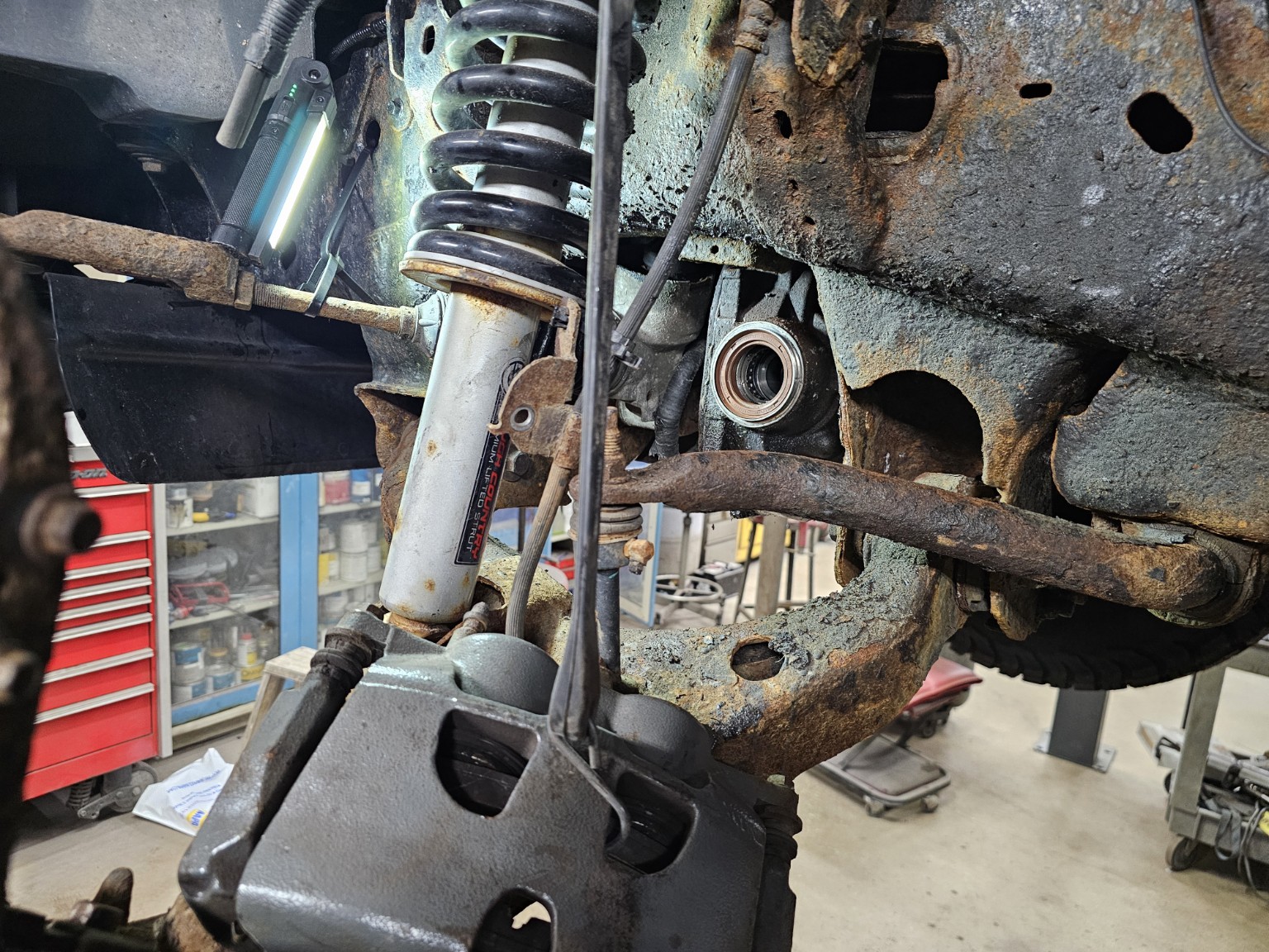 CV axle removed from the front differential of a 2011 Ford F-150