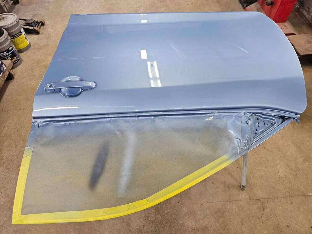 Fresh color and clear coat on a Toyota Camry replacement door