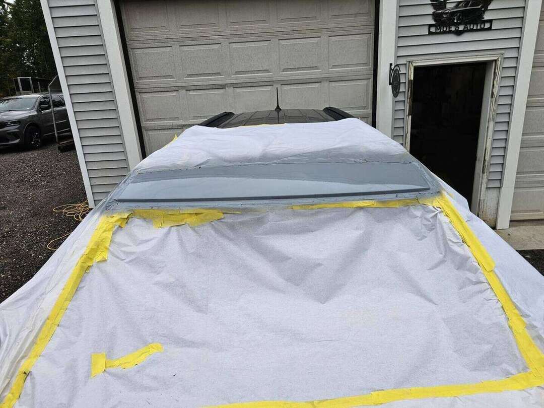 Dodge Durango roof rust repair masked and sealed before paint