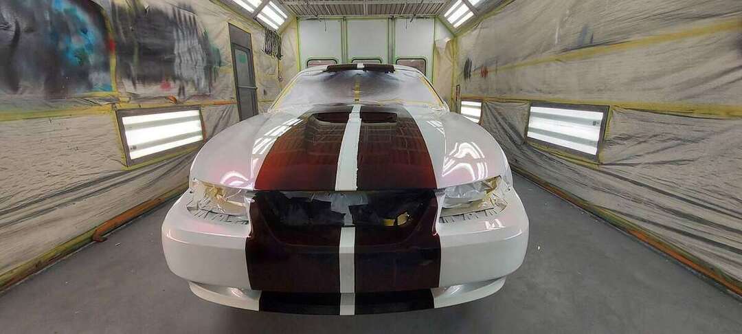 Front view of the Mustang with completed burgundy stripes